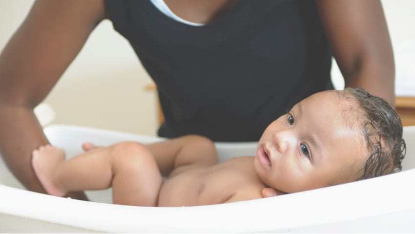 bathing-baby-body_850-1.jpg baby being bathed