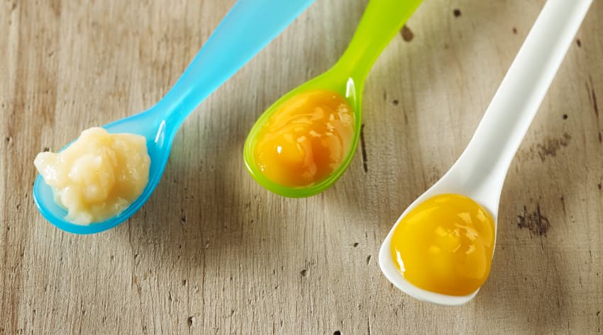 Baby spoons with baby food Baby spoons with baby food
