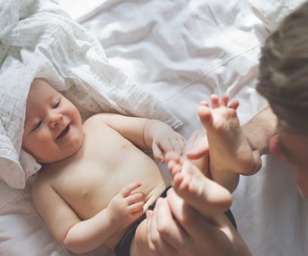 baby getting their nappy changed