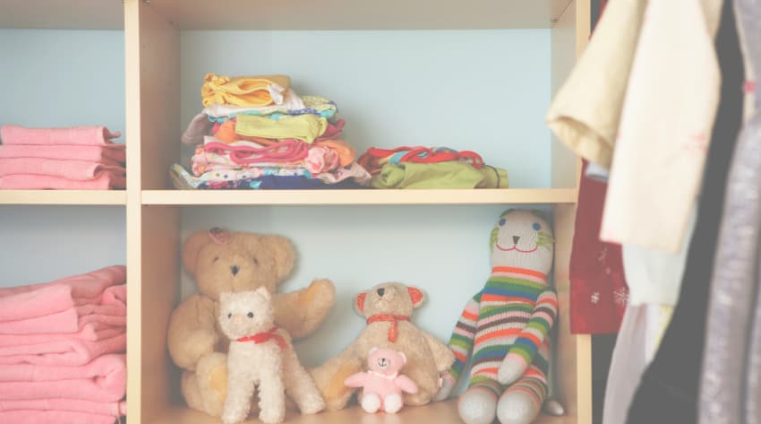 nursery-preparation-body_850-3.jpg shelves with towels, baby clothes and stuffed animals