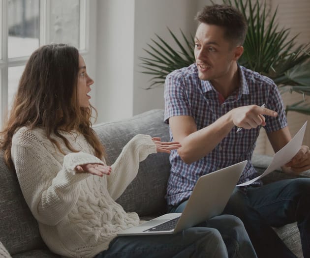 a mother and a father researching and debating on baby names