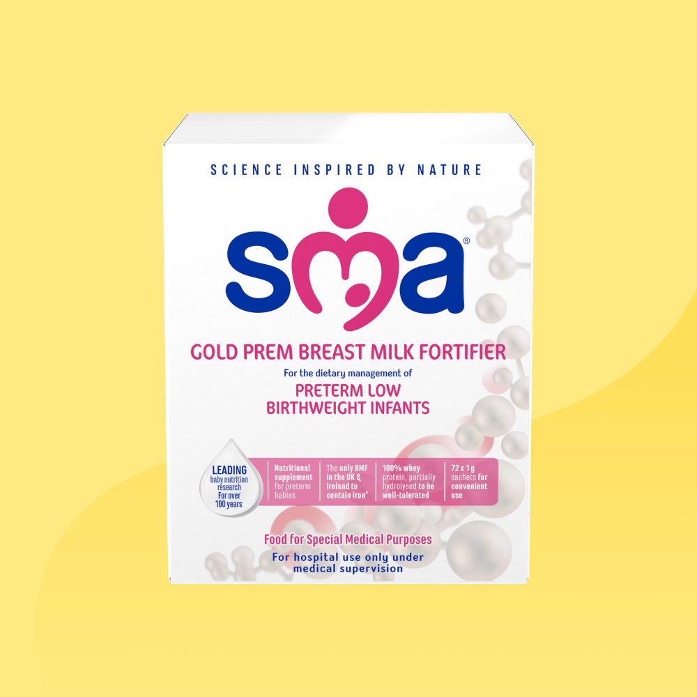 Box of SMA Gold Prem Breast Milk Fortifier in front of a yellow background 