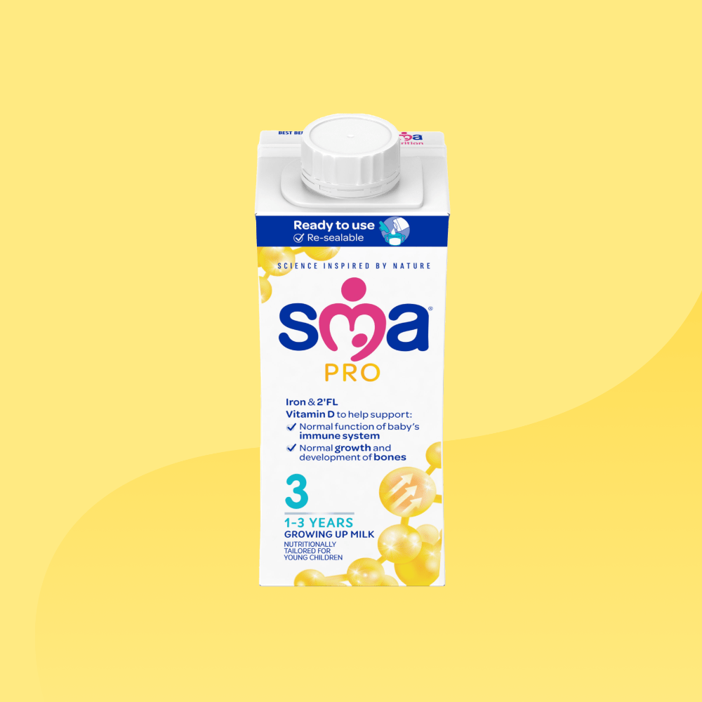 Carton of SMA Toddler Milk Ready to Drink 200ml for children 1 to 3 years on a yellow background
